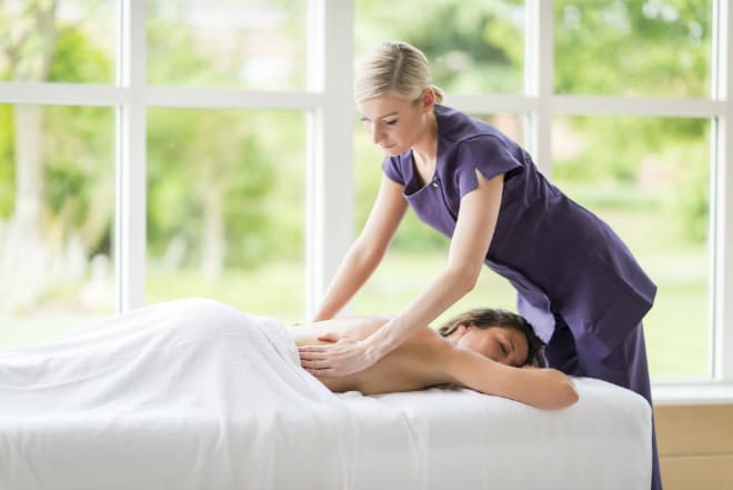 Guest enjoying a back massage at Ragdale Hall