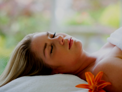 Lady relaxing after a treatment darkened