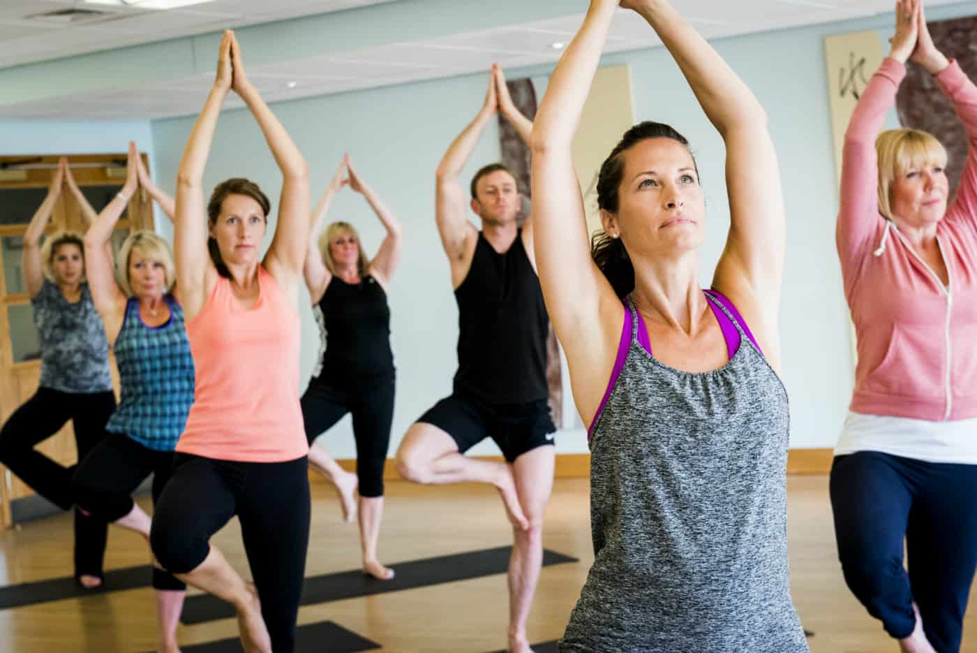 Guests doing Yoga in studio during fitness break