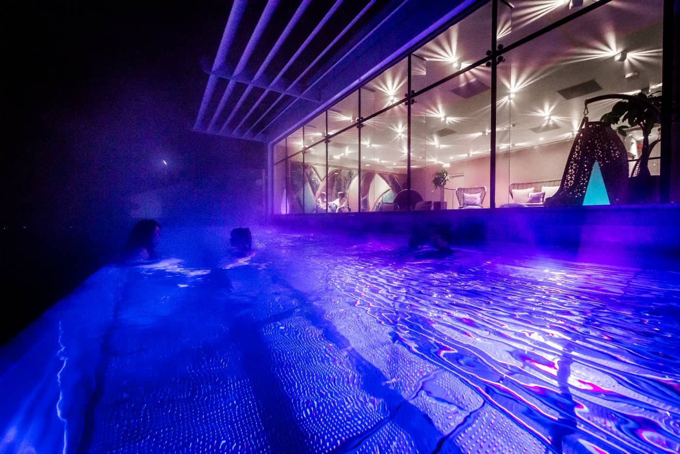 Infinity pool at night during overnight spa breaks