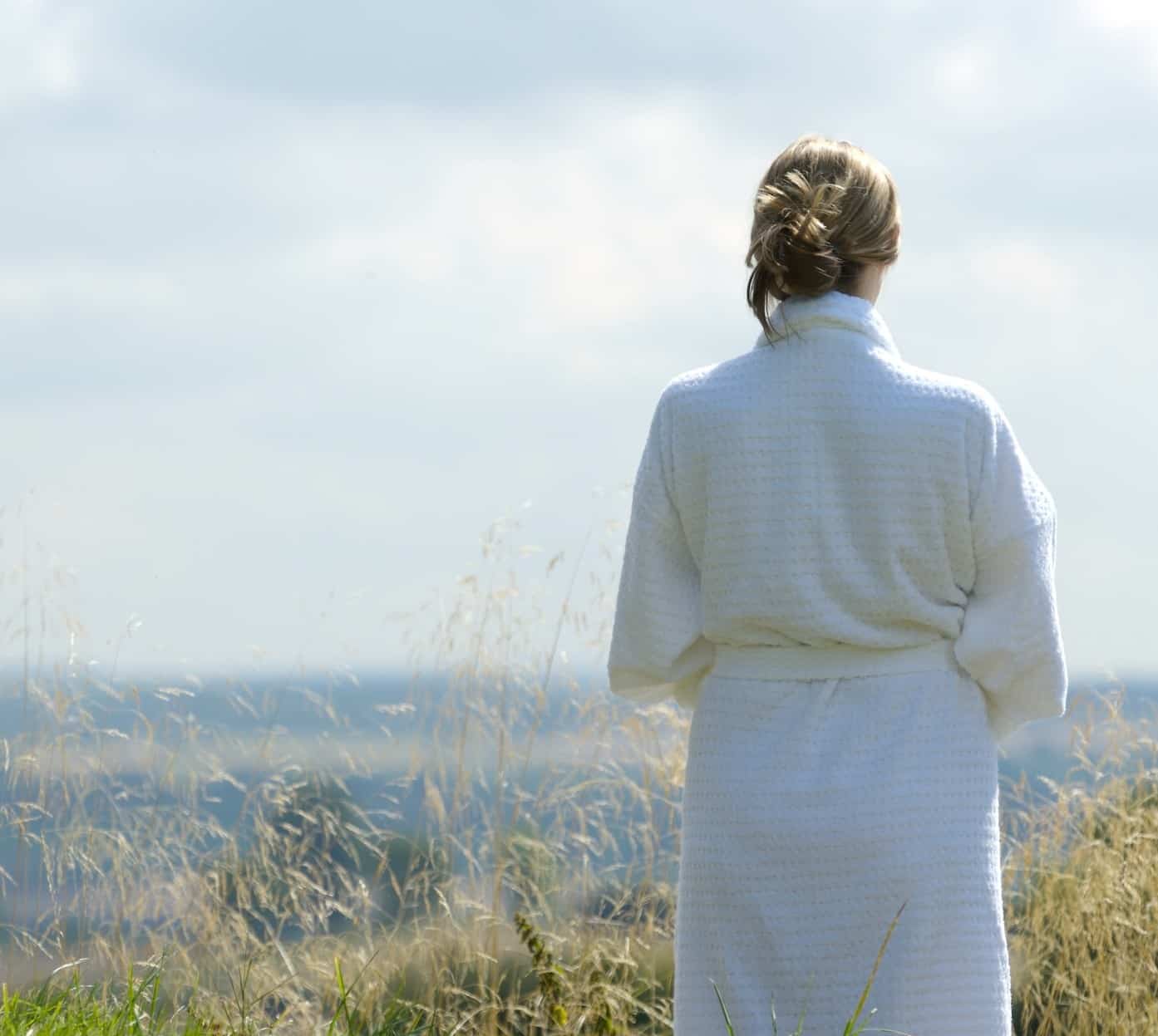 lady in robe looking at view (1)