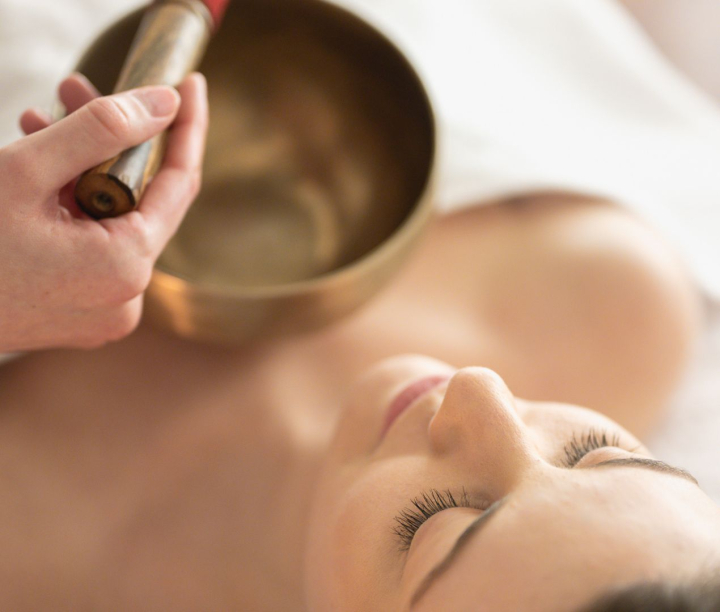 Lady receiving a wellness treatment at the Spa