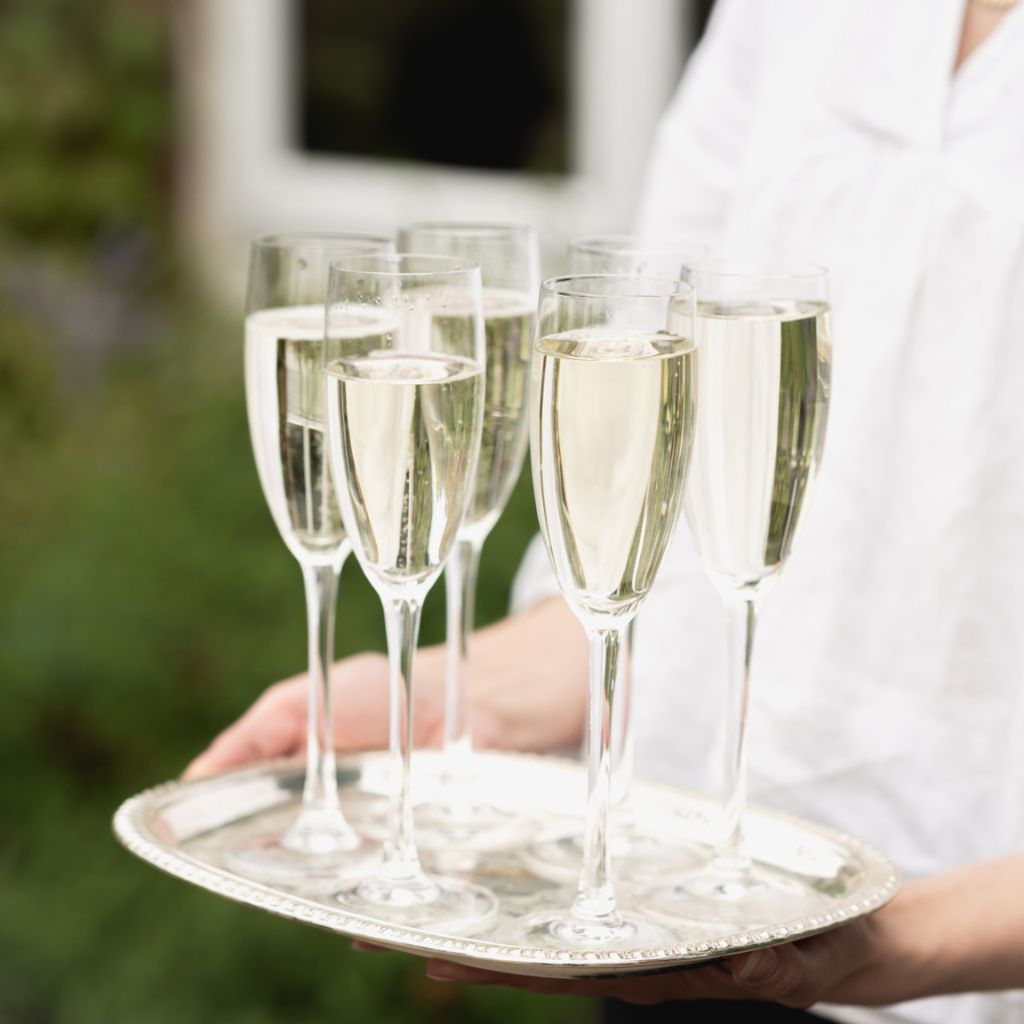 Champagne in flutes being served at Ragdale